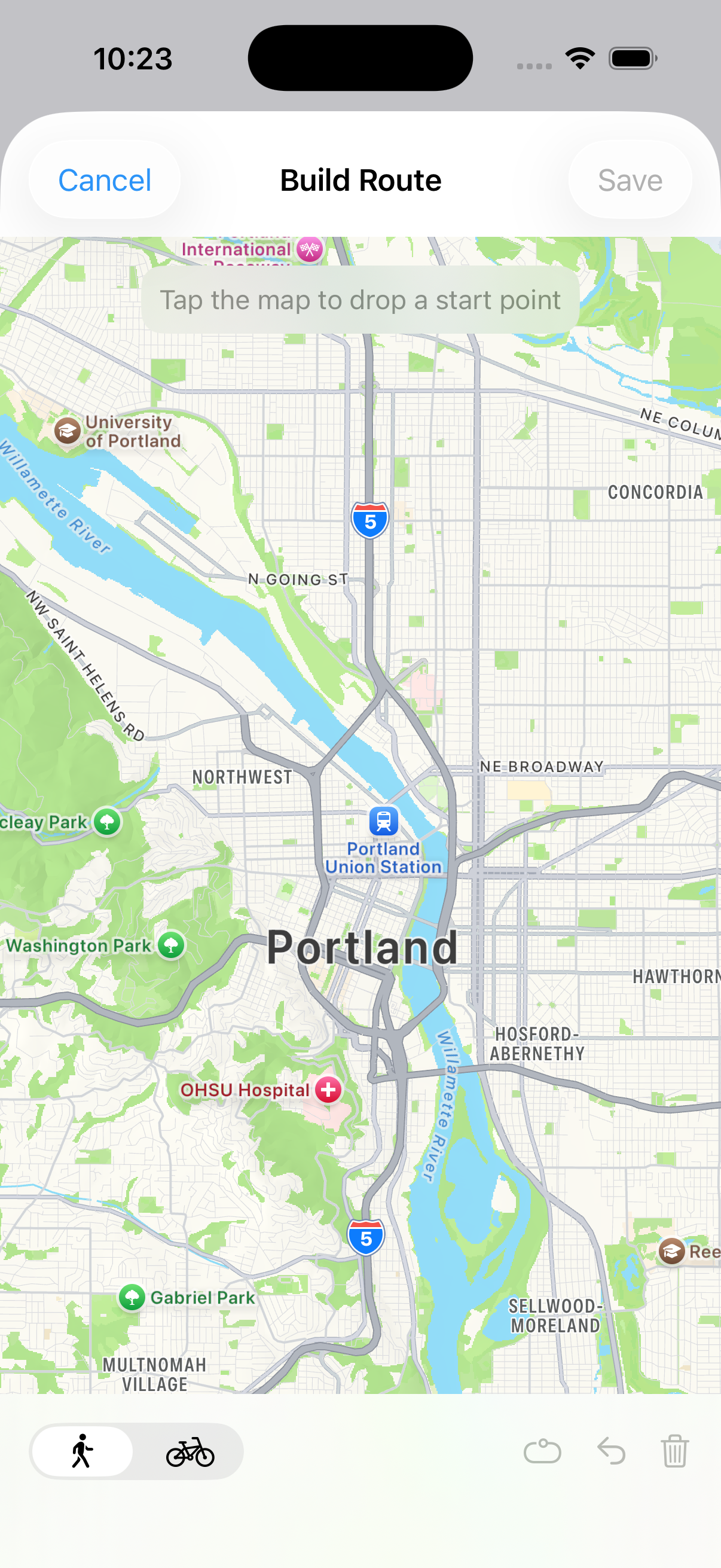 Build Route screen with an empty map and the "Tap the map to drop a start point" hint