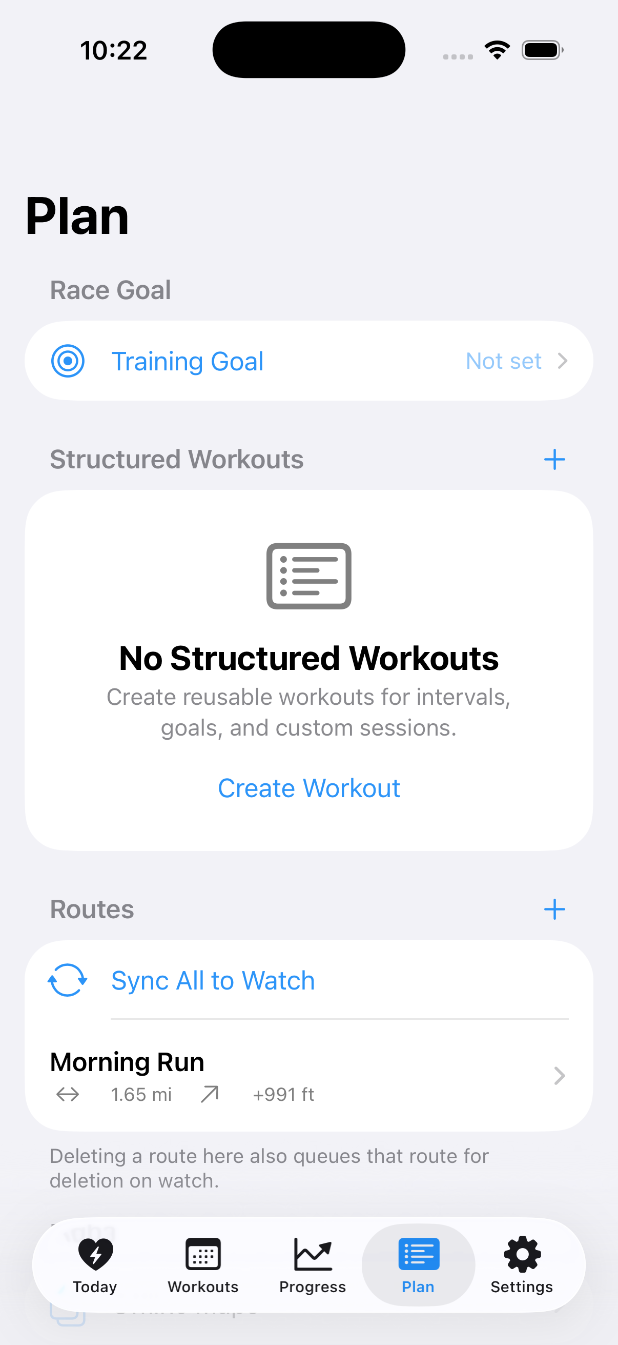 Plan tab on iPhone showing the Routes section with Sync All to Watch and a saved route listing its distance and elevation gain